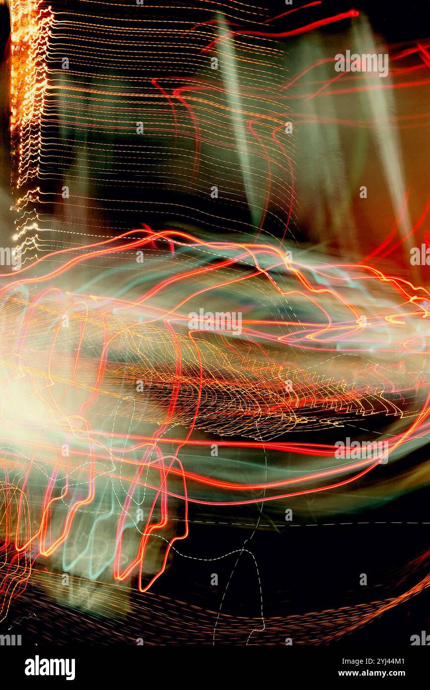 Neon lights glow and flash technology background with flying design elements Stock Photo