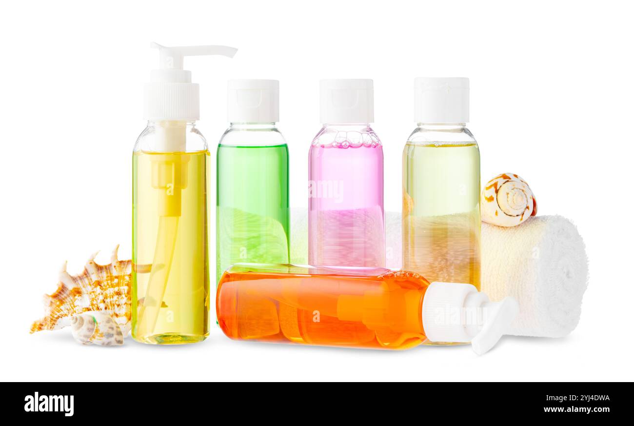 Assorted skincare products displayed on a white surface with a seashell Stock Photo