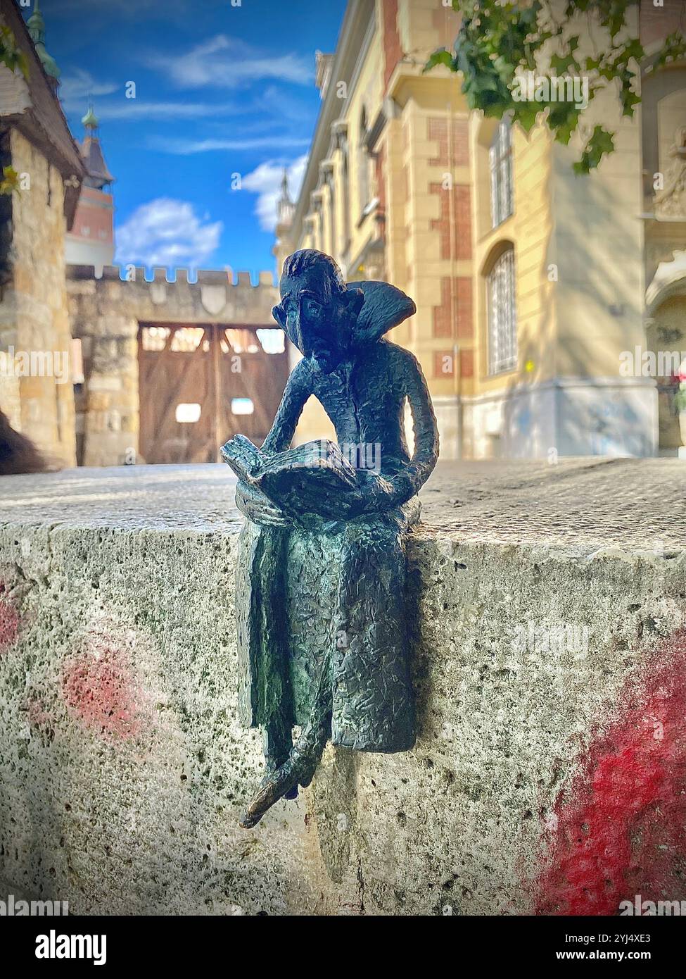 A mini statue of statue of Béla Lugosi, a Hungarian actor, as Count Dracula in the 1931 film found in the City Park in Vajdahunyad Castle. - Smartphone Captured Stock Image