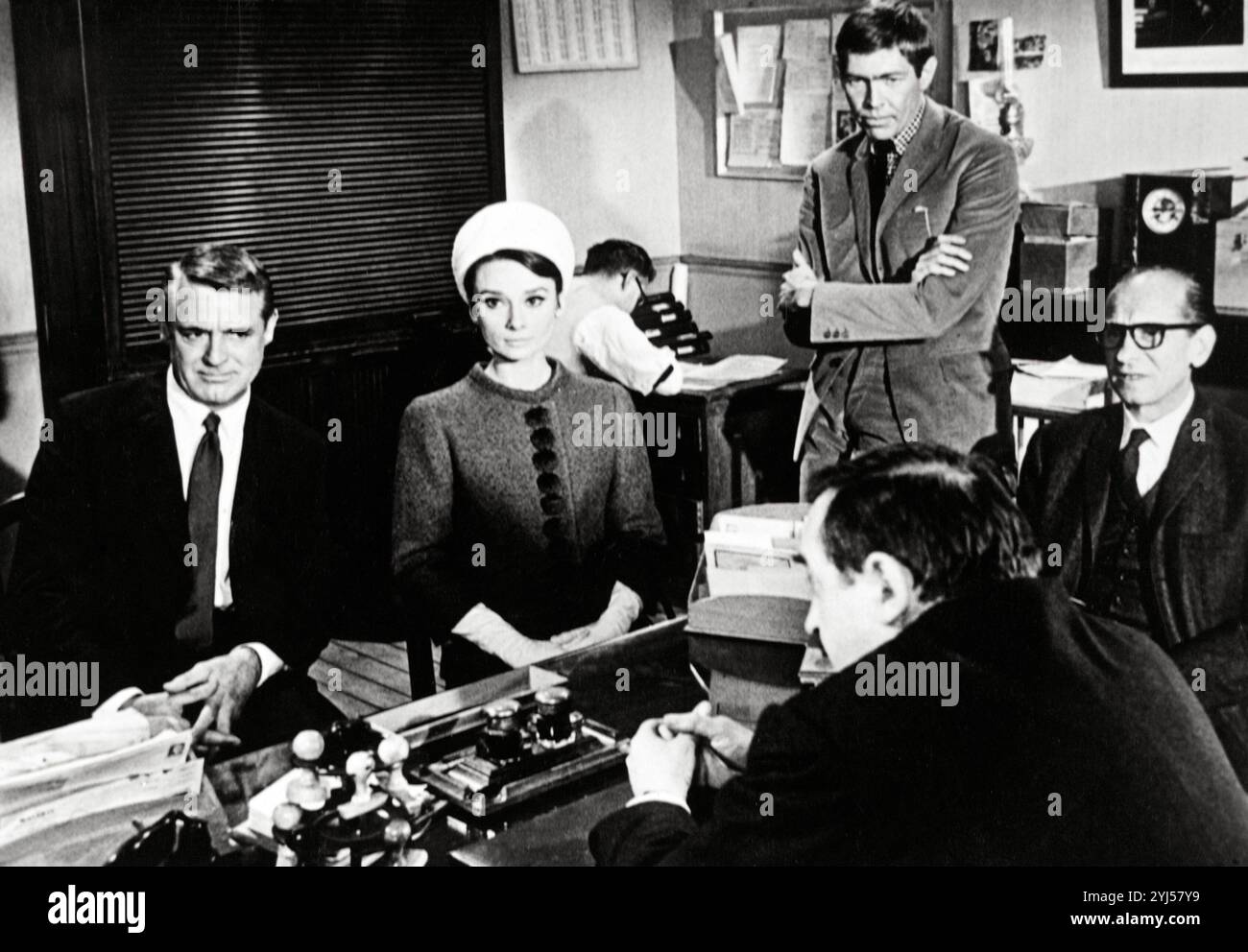 CARY GRANT, AUDREY HEPBURN and JAMES COBURN in CHARADE (1963), directed by STANLEY DONEN. Credit: UNIVERSAL PICTURES / Album Stock Photo