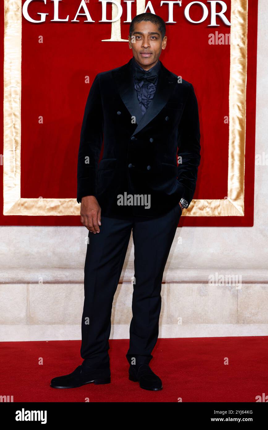 Alexander Karim poses for photographers upon arrival at the premiere of