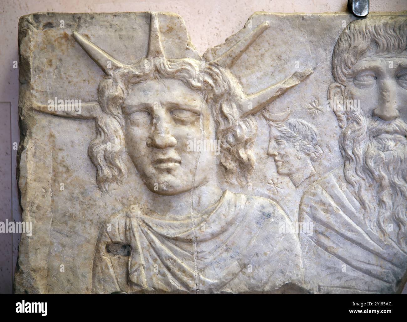 Sol invectus, moon and Jupiter Dolichenus. 2nd century AD. Detail.National Roman Museum. The Baths of Diocletian. Rome. Italy. Stock Photo
