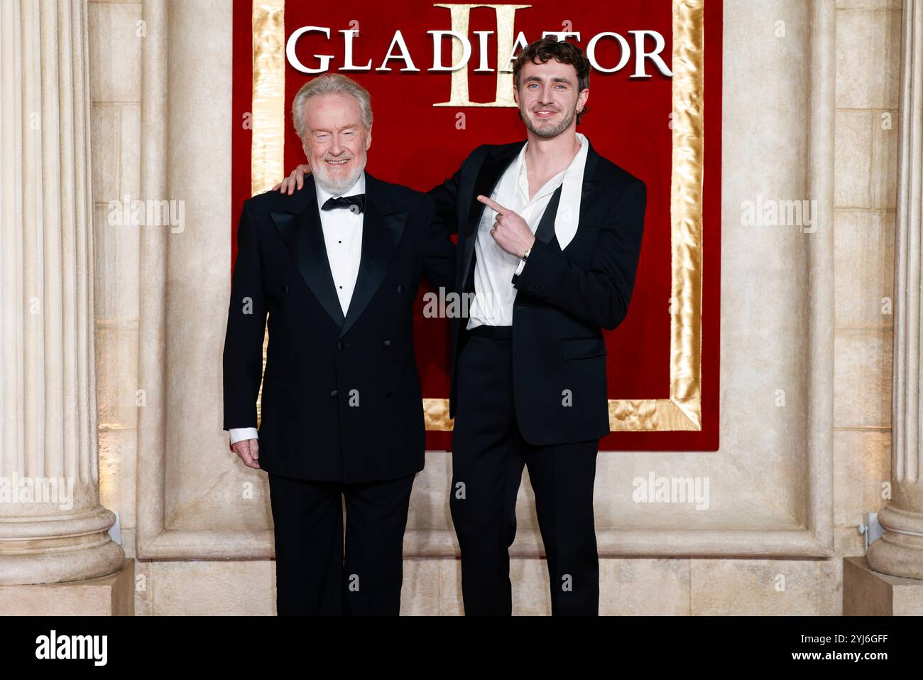 Ridley Scott, left, and Paul Mescal pose for photographers upon arrival ...