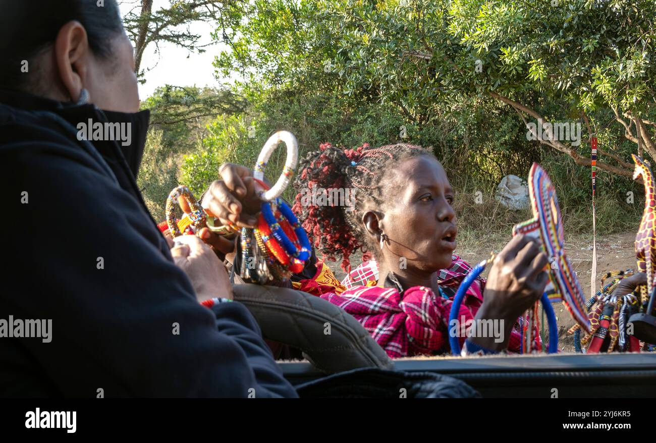 Masaai women selling souvenirs to safari tourists Tanzania, East Africa Stock Photo