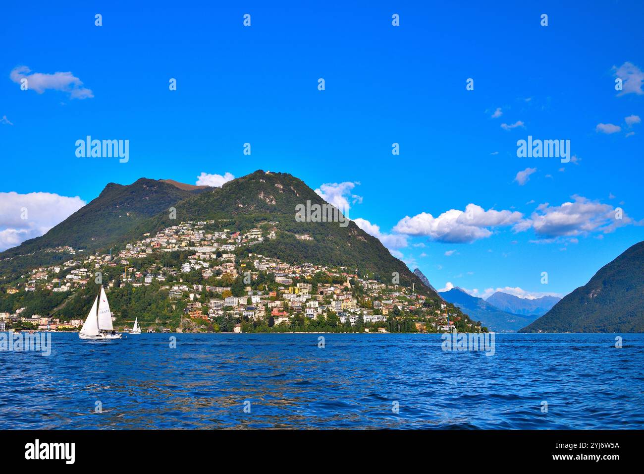 a-very-sunny-day-on-lake-lugano-stock-photo-alamy