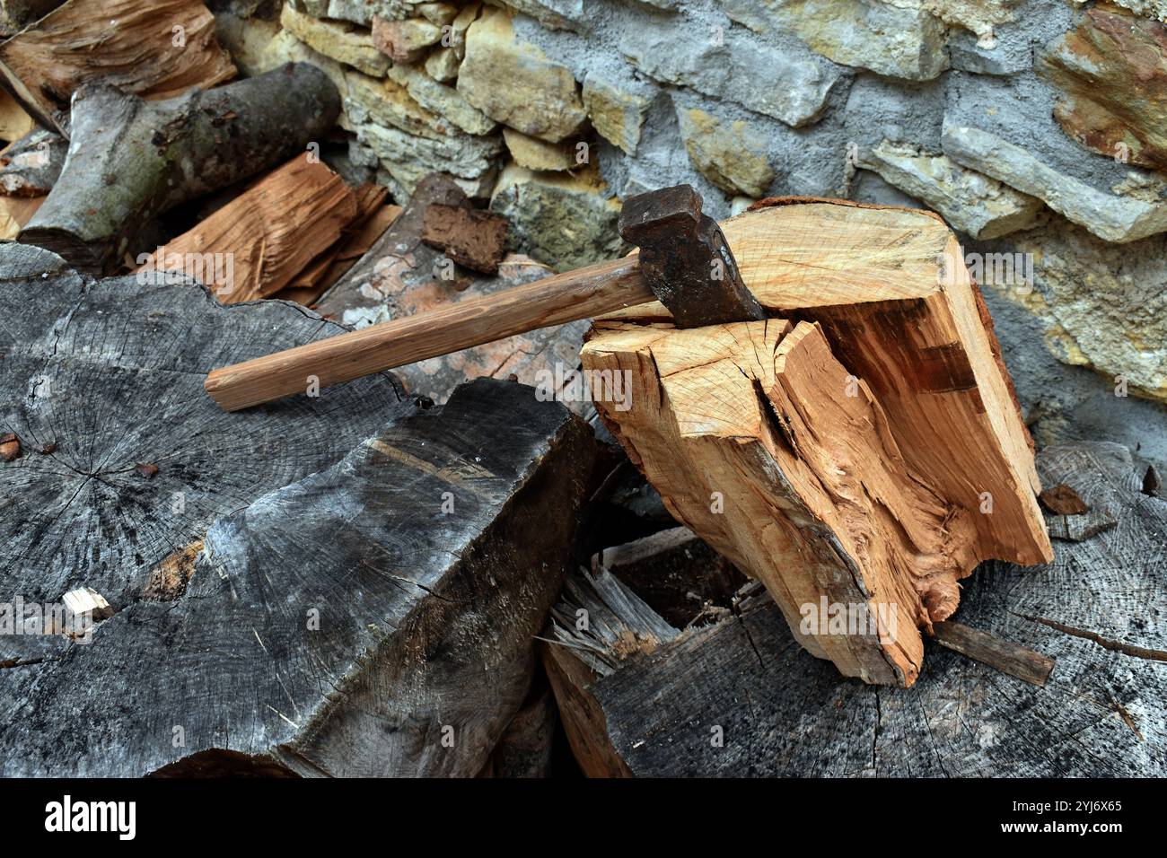 Log of firewood split with an axe Stock Photo - Alamy