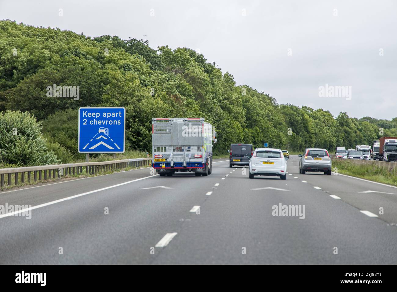 Chevron sign on road hi-res stock photography and images - Alamy