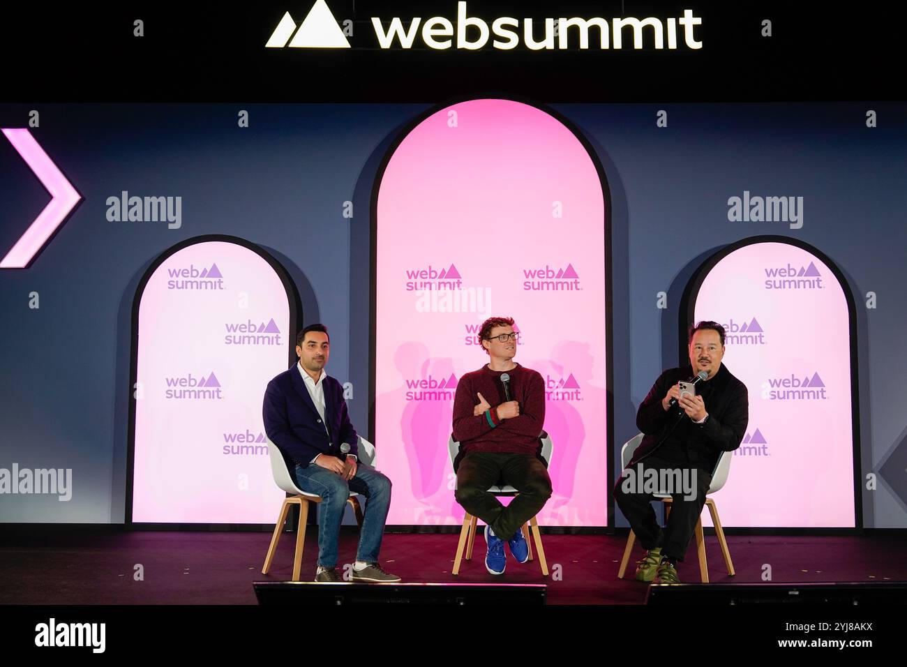 Lisboa, Portugal. 13th Nov, 2024. Sheikh Jassim bin Mansour bin Jabor Al Thani, Director of the Government Communications Office Communications Office, Government of Qatar (L), Paddy Cosgrave, CEO & Founder Web Summit (C), and Casey Lau, Co-host Web Summit (R), addresses the audience during the second day of WEB SUMMIT 2024 in Lisbon.Portugal. 11/13/2024 Credit: Brazil Photo Press/Alamy Live News Stock Photo