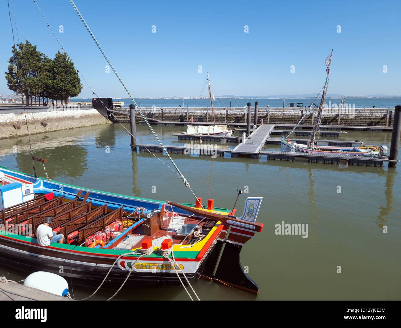 Lisbon, Portugal - Colorful typical boat in Lisbon navy dock on a sunny day - Smartphone Captured Stock Image