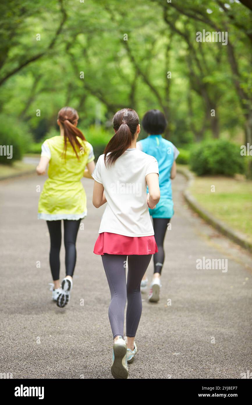 Woman and friend and rear view hi-res stock photography and images - Alamy