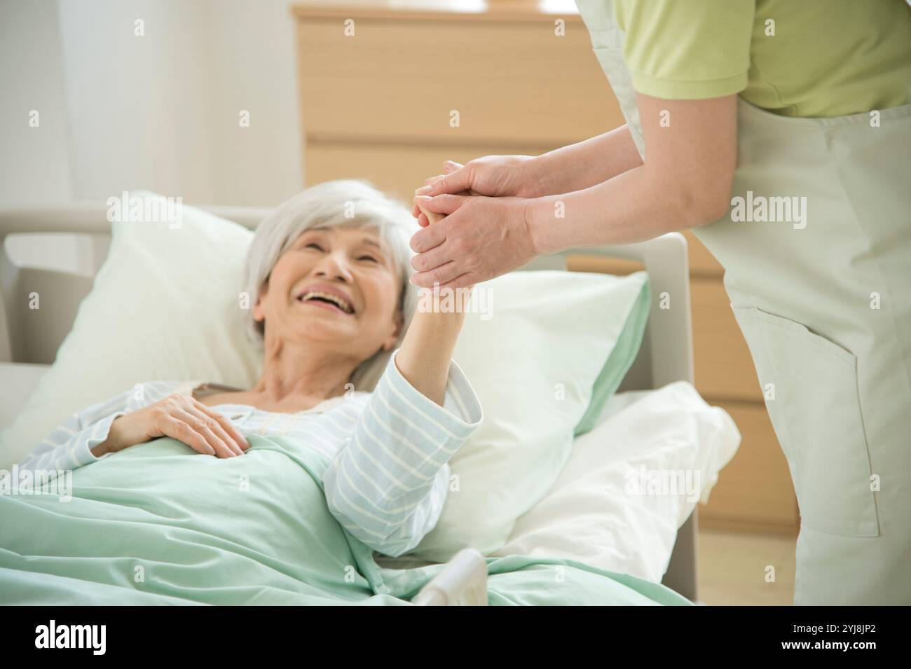 Elderly care home bed hi-res stock photography and images - Alamy