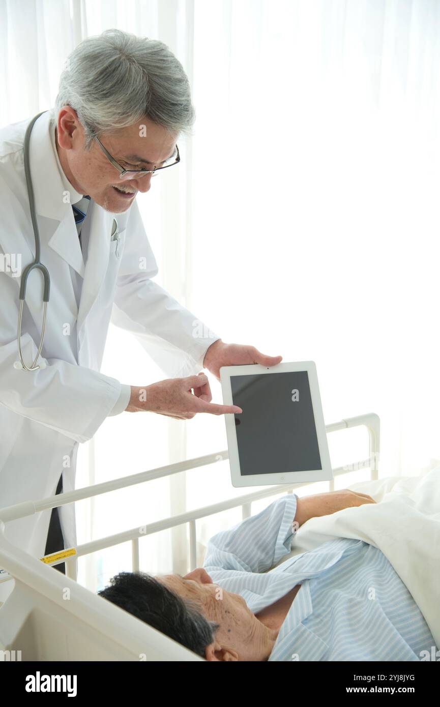 Japanese doctor old hi-res stock photography and images - Alamy