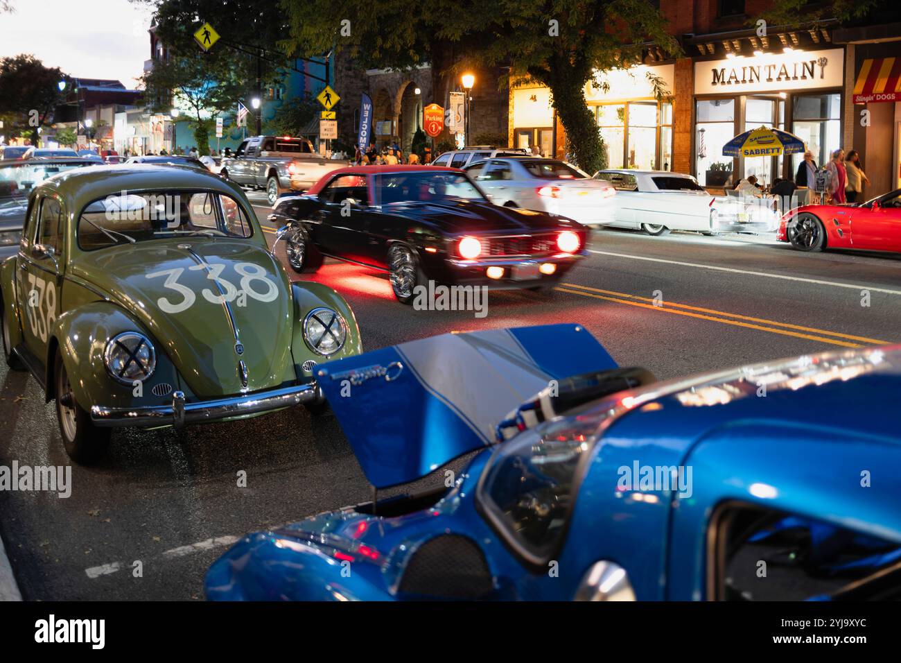 Antique Cars Parked and  Pass By on Main Street Somerville During Cruize Night, New Jersey Stock Photo