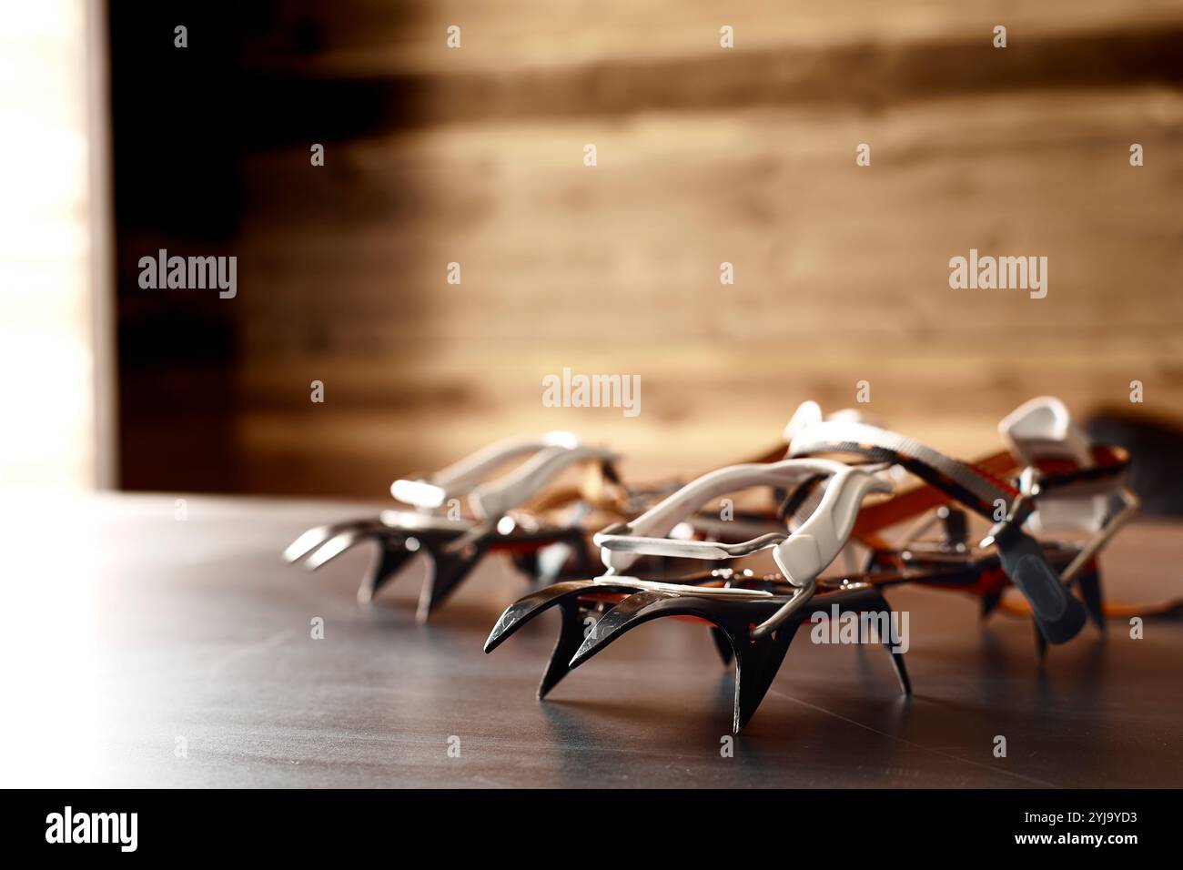 Crampons on the floor of the hut Stock Photo