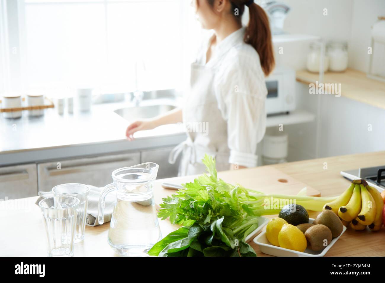 Woman celery cooking hi-res stock photography and images - Alamy