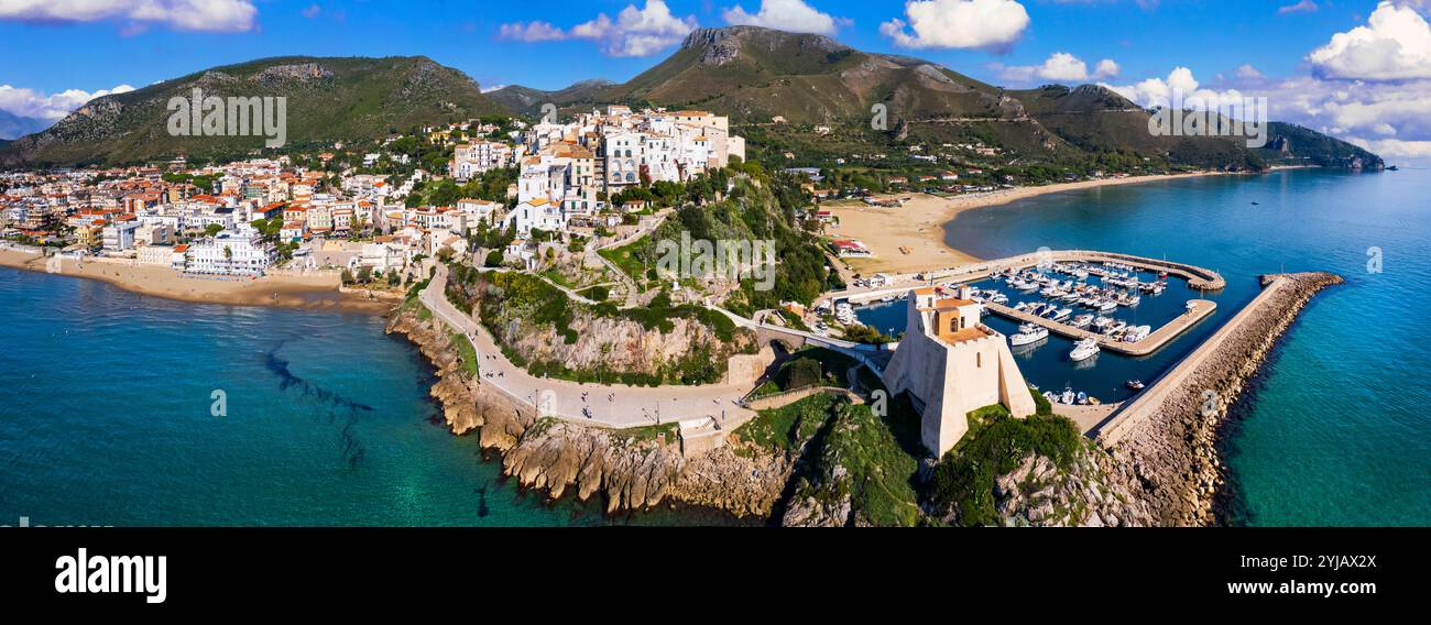 Aerial view of old town Sperlonga and beach, ancient Italian city in province Latina on Tyrrhenian sea, tourists summer vacaton destination. Stock Photo