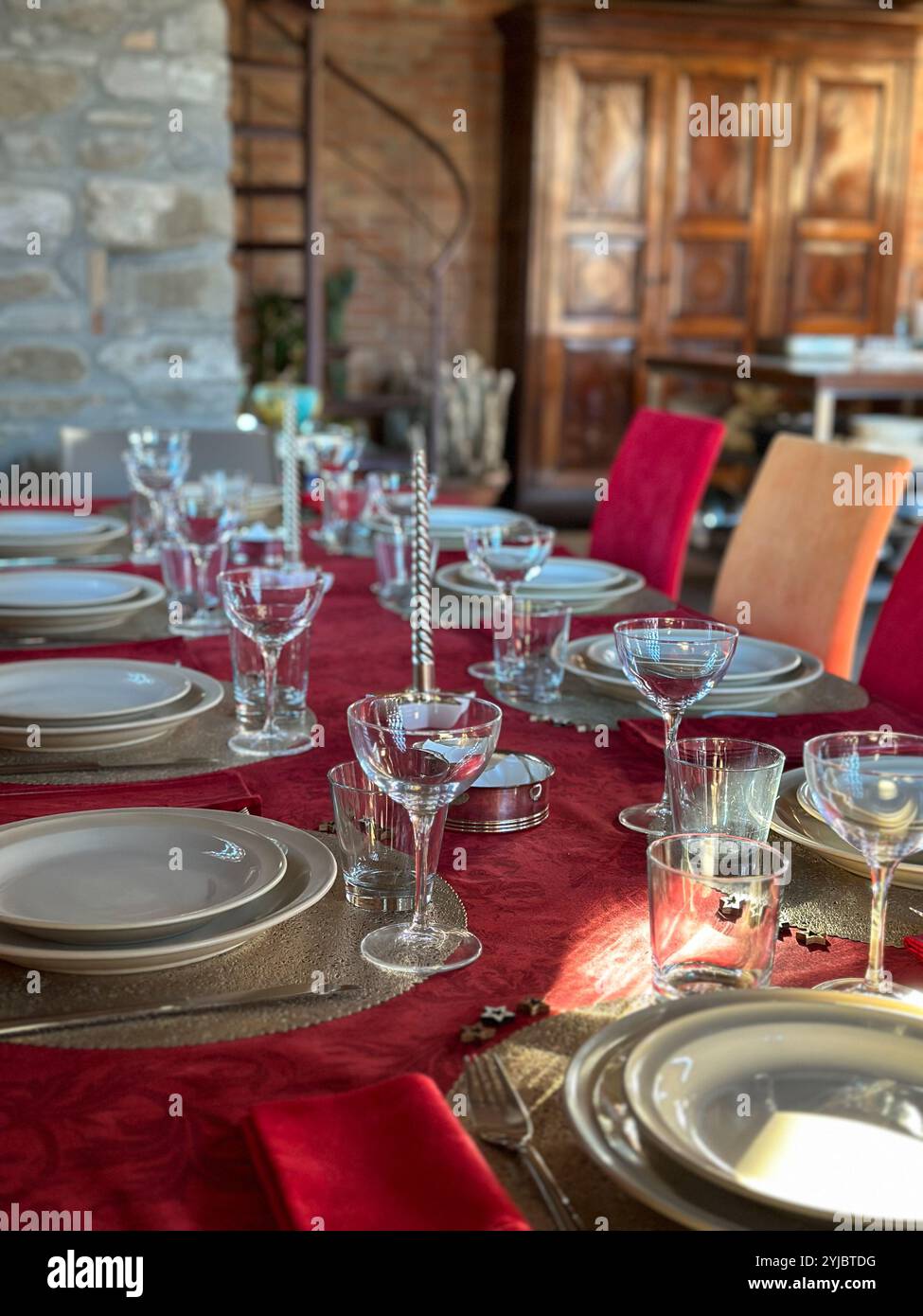 beautiful table setting with christmas decoration in living room Stock Photo