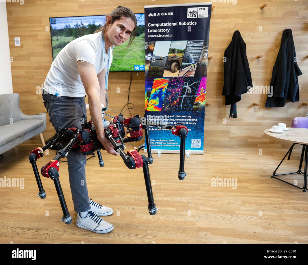 Prague, Czech Republic. 14th Nov, 2024. AI HotSpot: Innovate, Implement, Inspire conference to present various AI innovations including robotic hotel receptionist in Prague, Czech Republic, November 14, 2024. Rudolf Szadkowski, of Computational Robotics Lab presents hexapods robot Daisy of Artificial Intelligence Center Faculty of Electrical Engineering of Czech Technical University. Credit: Michaela Rihova/CTK Photo/Alamy Live News Stock Photo