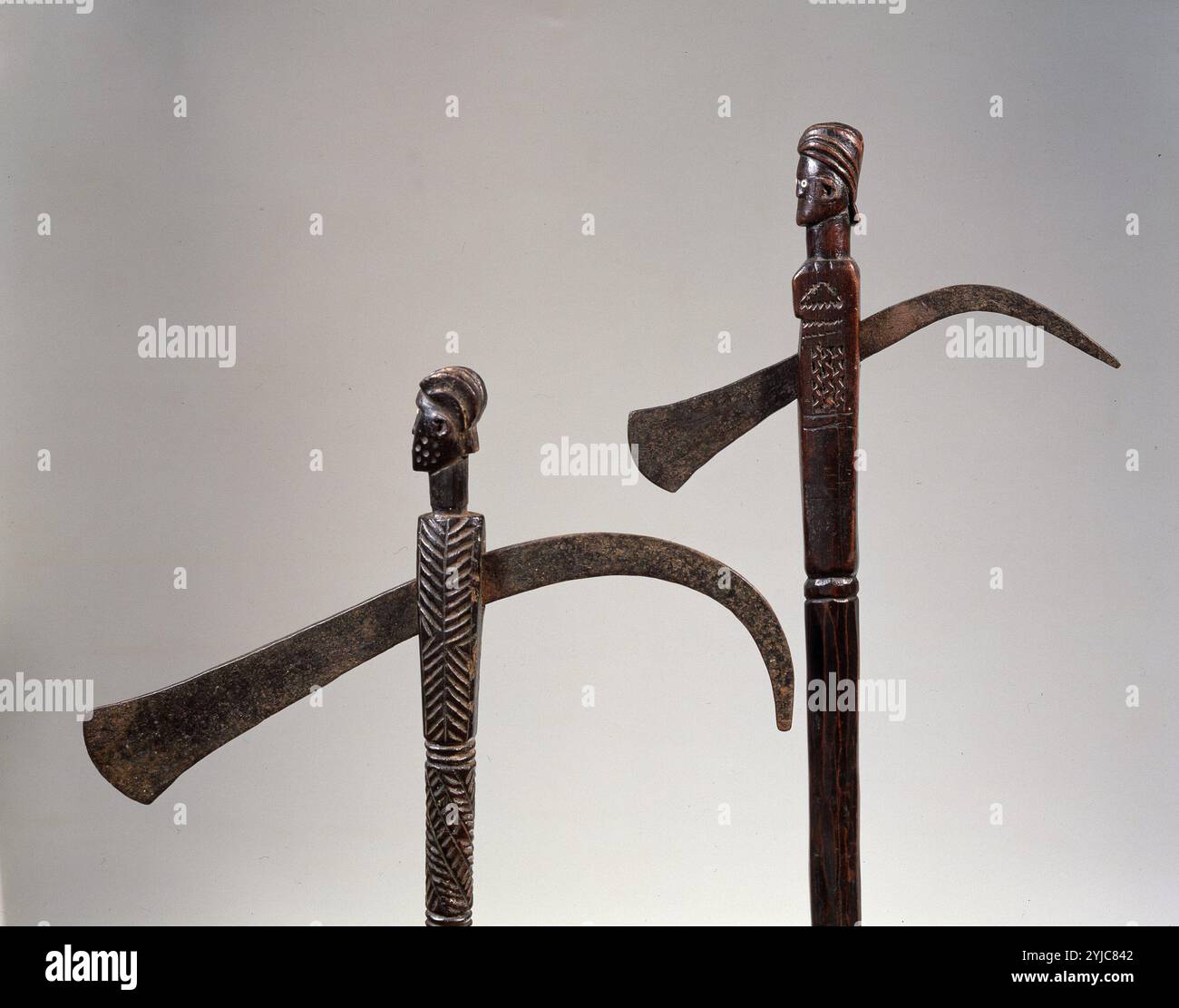 Engraved wooden axes with heads used by Zaramo people, Tanzania, XIXth century. Private Collection. Stock Photo