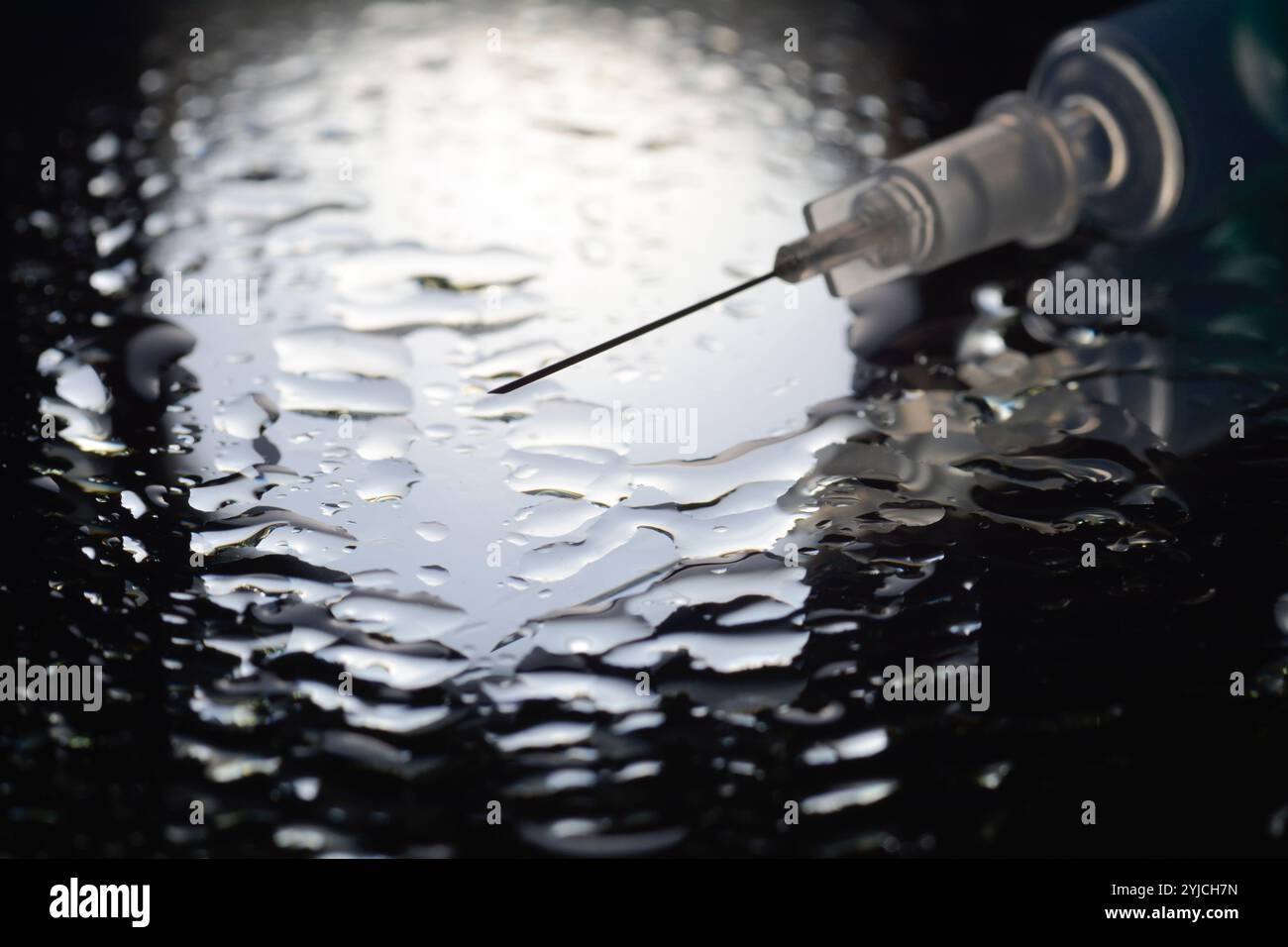 Concept photo of a medical injection needle Stock Photo - Alamy