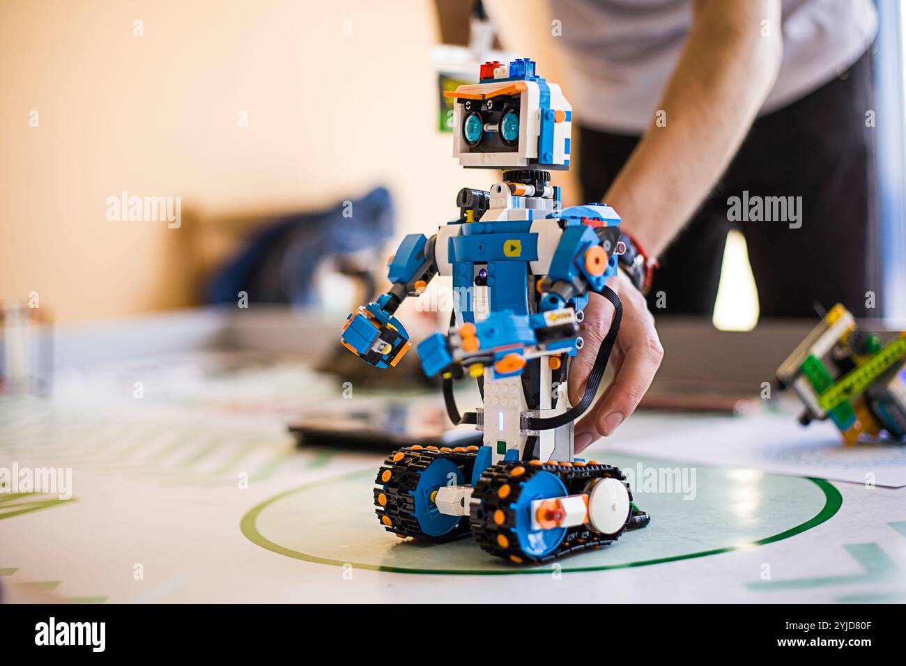 Stem educations,inventor school. School boys planning of innovation robot model in laptop. DIY robot in science education class Stock Photo