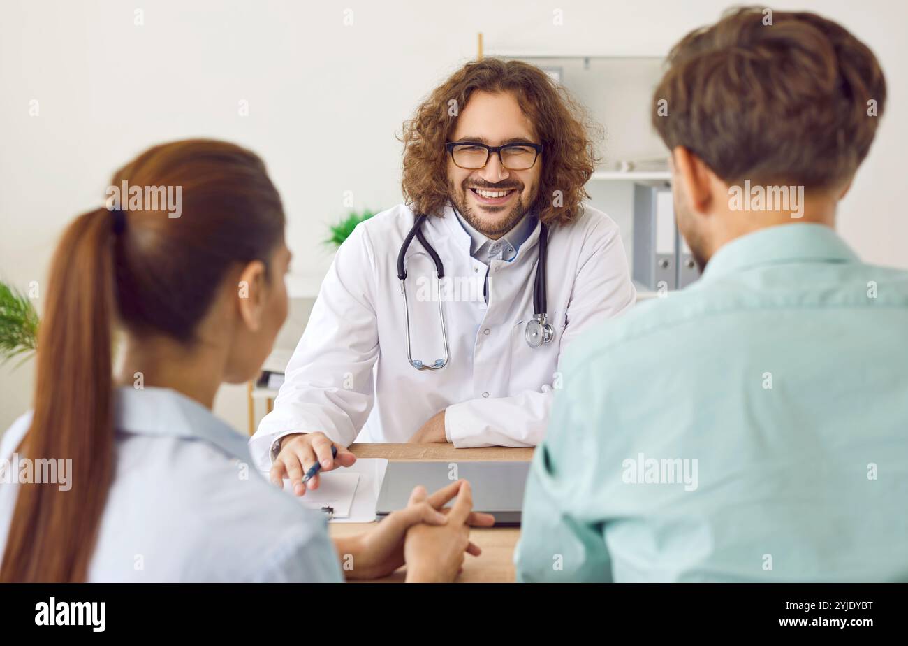 Doctor advises married couple medical hi-res stock photography and ...