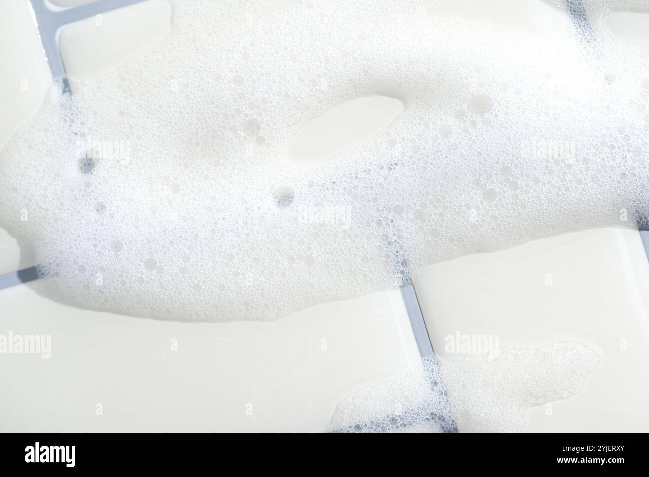 Soap Bubbles on Clean White Bathroom Tiles Stock Photo - Alamy