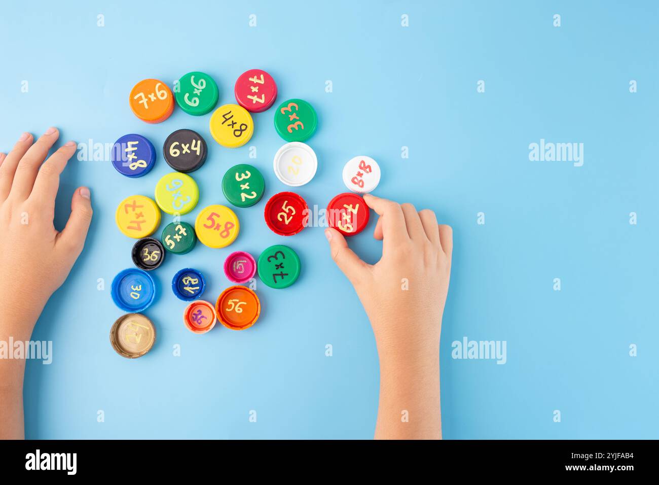 Play fun multiplication games, bottle caps with multiplication ...