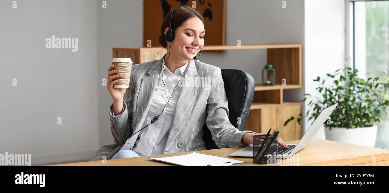 Female technical support agent working in office Stock Photo - Alamy