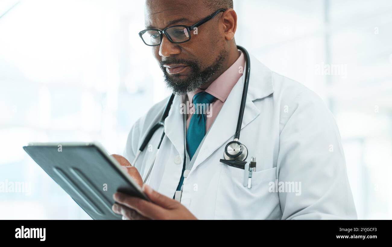 Black male patient black doctor hi-res stock photography and images - Alamy