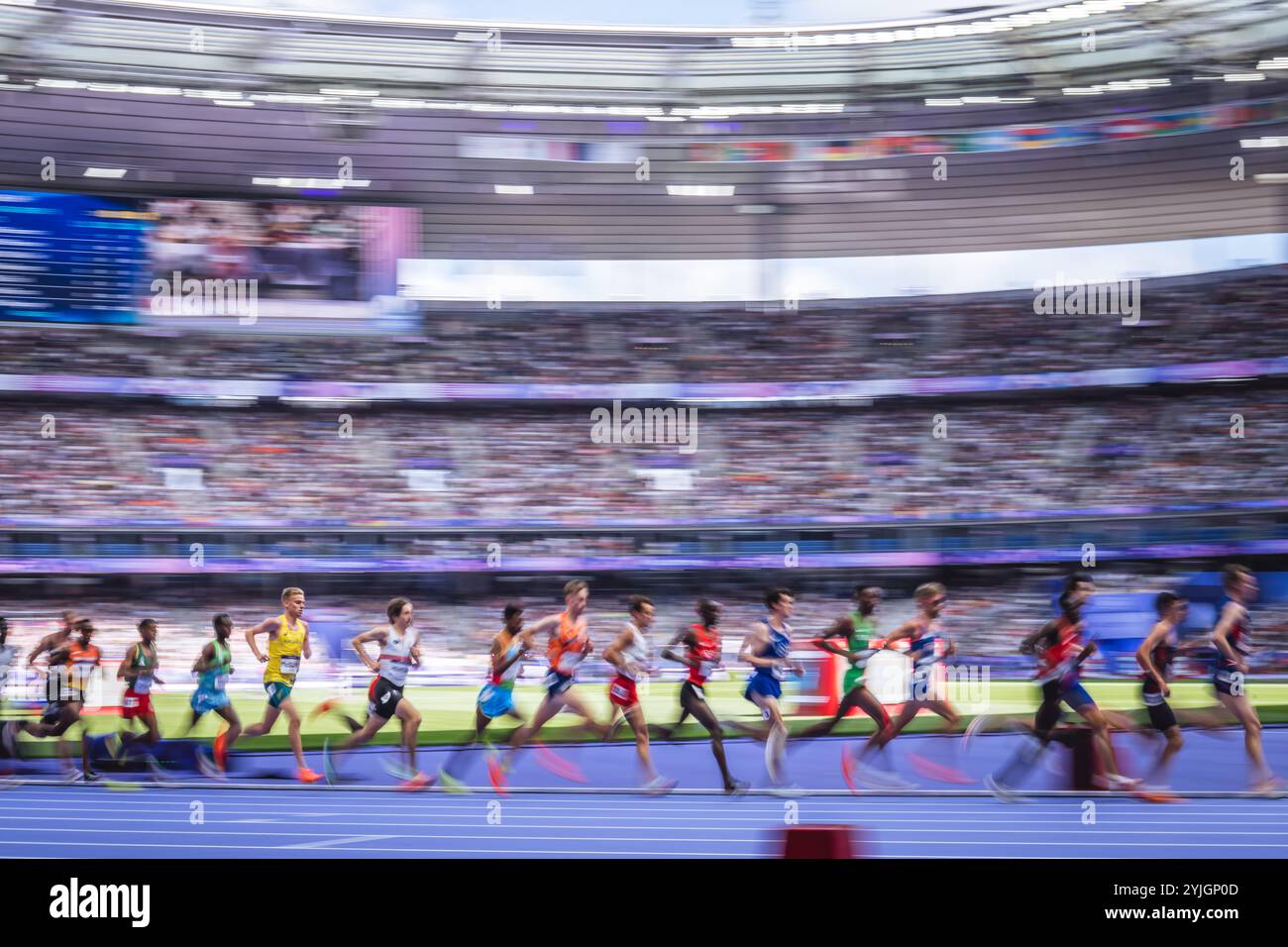 Image of Runners in motion in the 5000 meters at the Paris 2024 Olympic ...