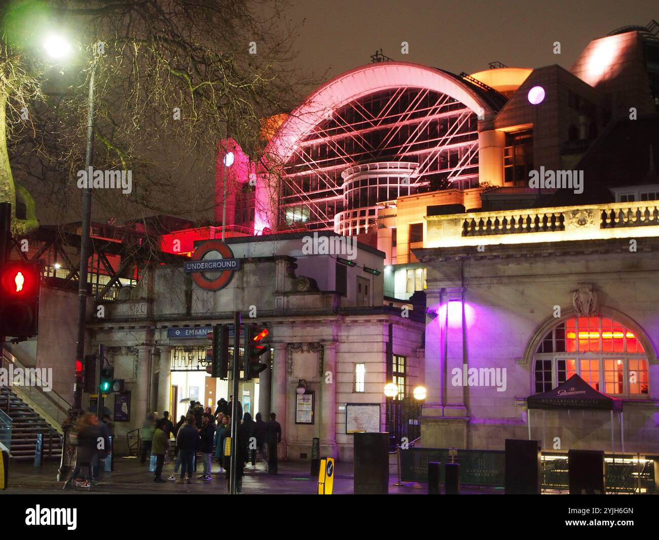 Entrance to Embankment tube station at night in London, United Kingdom. Concept: public transport, going out, urban lifestyle Stock Photo