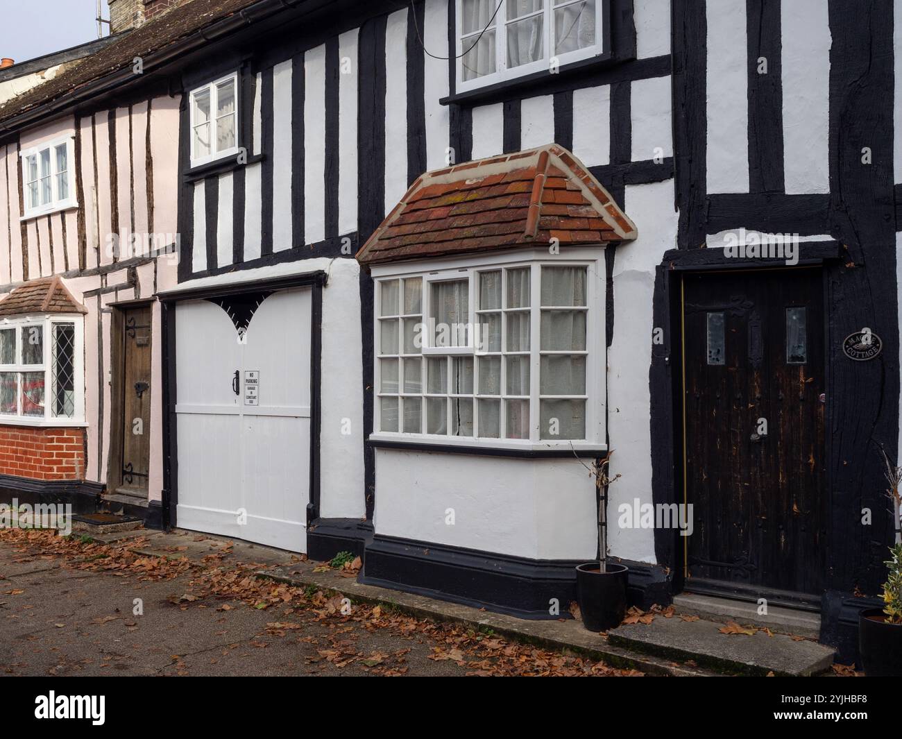 Terrace of old half timbered houses fronting Hall St, Long Melford, Suffolk, UK Stock Photo