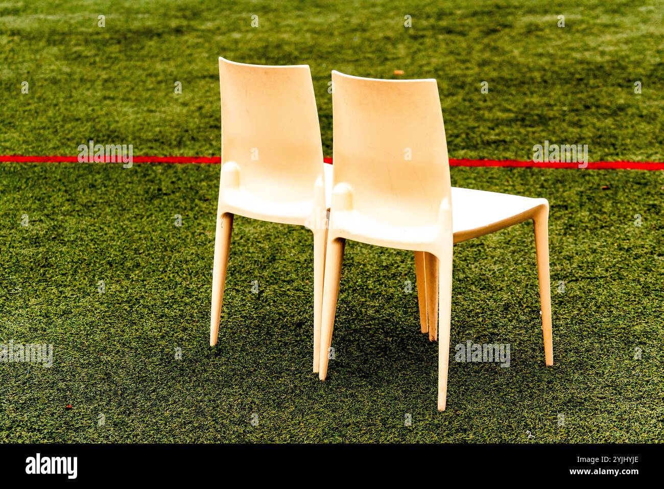 Chairs white grass hi-res stock photography and images - Alamy