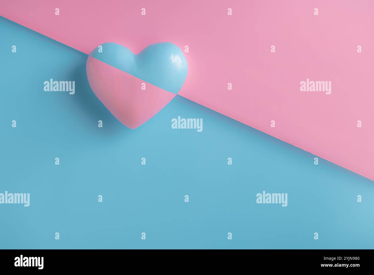 Pink and blue heart pon a blue and pink background in soft focus for ...