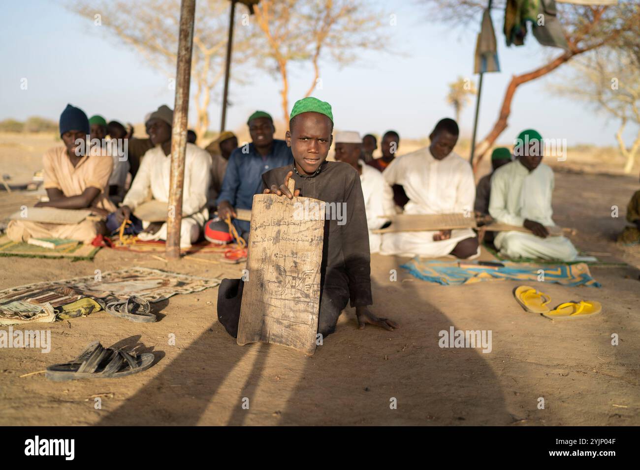 N'Djamena, Chad - March 19 2019:A young man memorizing the Qur'an at a local madrasah in Africa Stock Photo