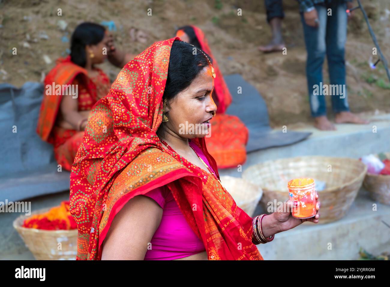 Kathmandu, Nepal - November 07, 2024 : Chhath Puja Parwa Sun God Celebration with Fruits, Lights and Lamps in river side pond in Nepal and India with Stock Photo