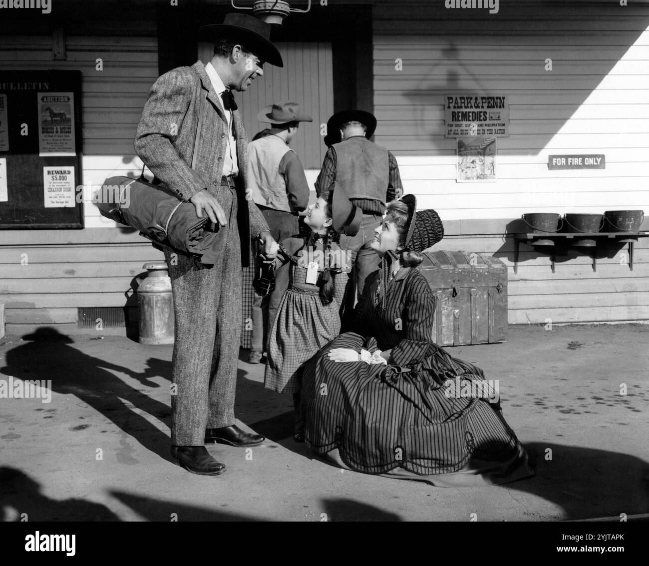 Fred MacMurray, Gina Gillespie, Dorothy Green, on-set of the western ...
