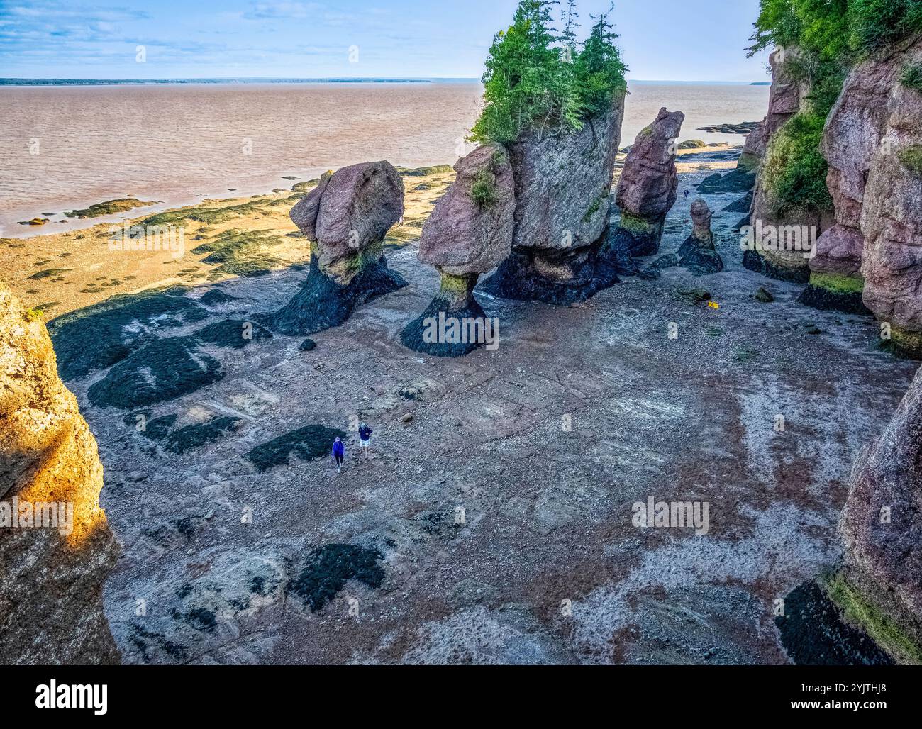 Peoplpe walking in Staircase Cove among the Sea Stacks on the Ocean ...