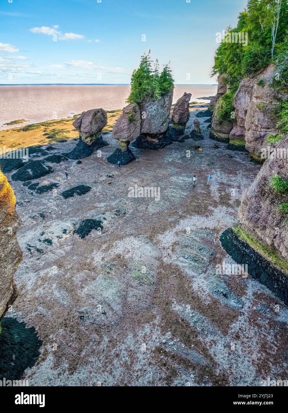 Peoplpe walking in Staircase Cove among the Sea Stacks on the Ocean ...