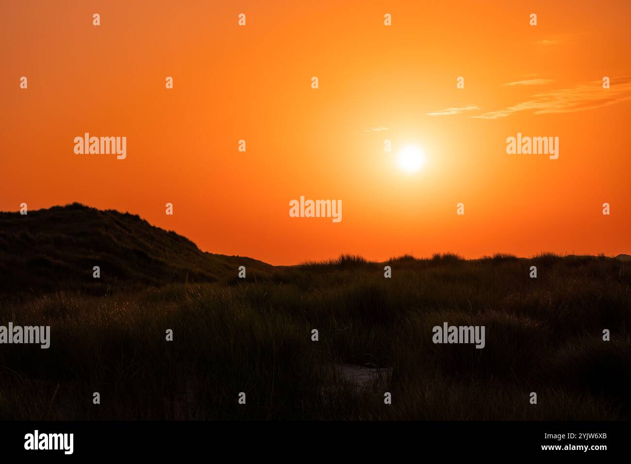 Sunset with intense orange sky Stock Photo