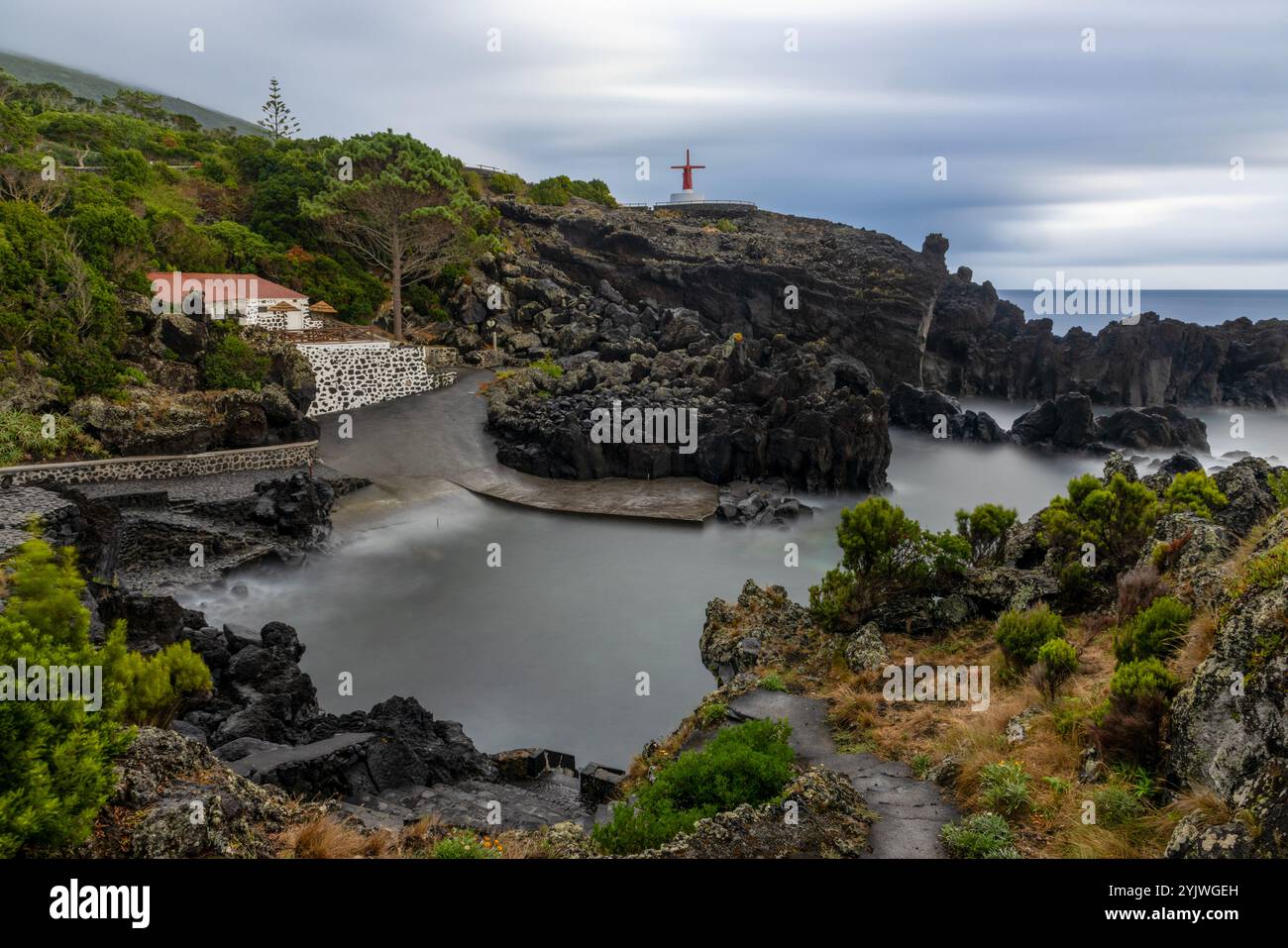 the-windmill-of-urzelina-sao-jorge-island-azores-is-located-next-to