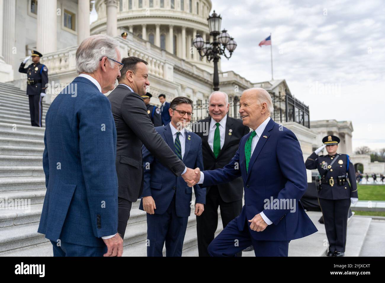 President Joe Biden greets Taoiseach Leo Varadkar, House Speaker Mike Johnson (R-LA), Rep. Mike Kelly (R-PA) and Rep. Richard Neal (D-MA) at the U.S. Capitol in Washington, D.C., Friday, March 15, 2024, as he arrives for the Friends of Ireland Luncheon. (Official White House Photo by Adam Schultz) Stock Photo