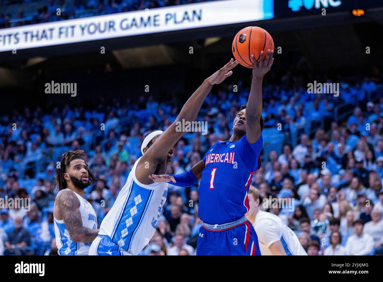 Chapel Hill, NC, USA. 15th Nov, 2024. North Carolina Tar Heels forward Ven-Allen Lubin (22) defends the shot from American University Eagles guard Elijah Stephens (1) during the second half of the NCAA basketball matchup at Dean Smith Center in Chapel Hill, NC. (Scott Kinser/CSM). Credit: csm/Alamy Live News Stock Photo