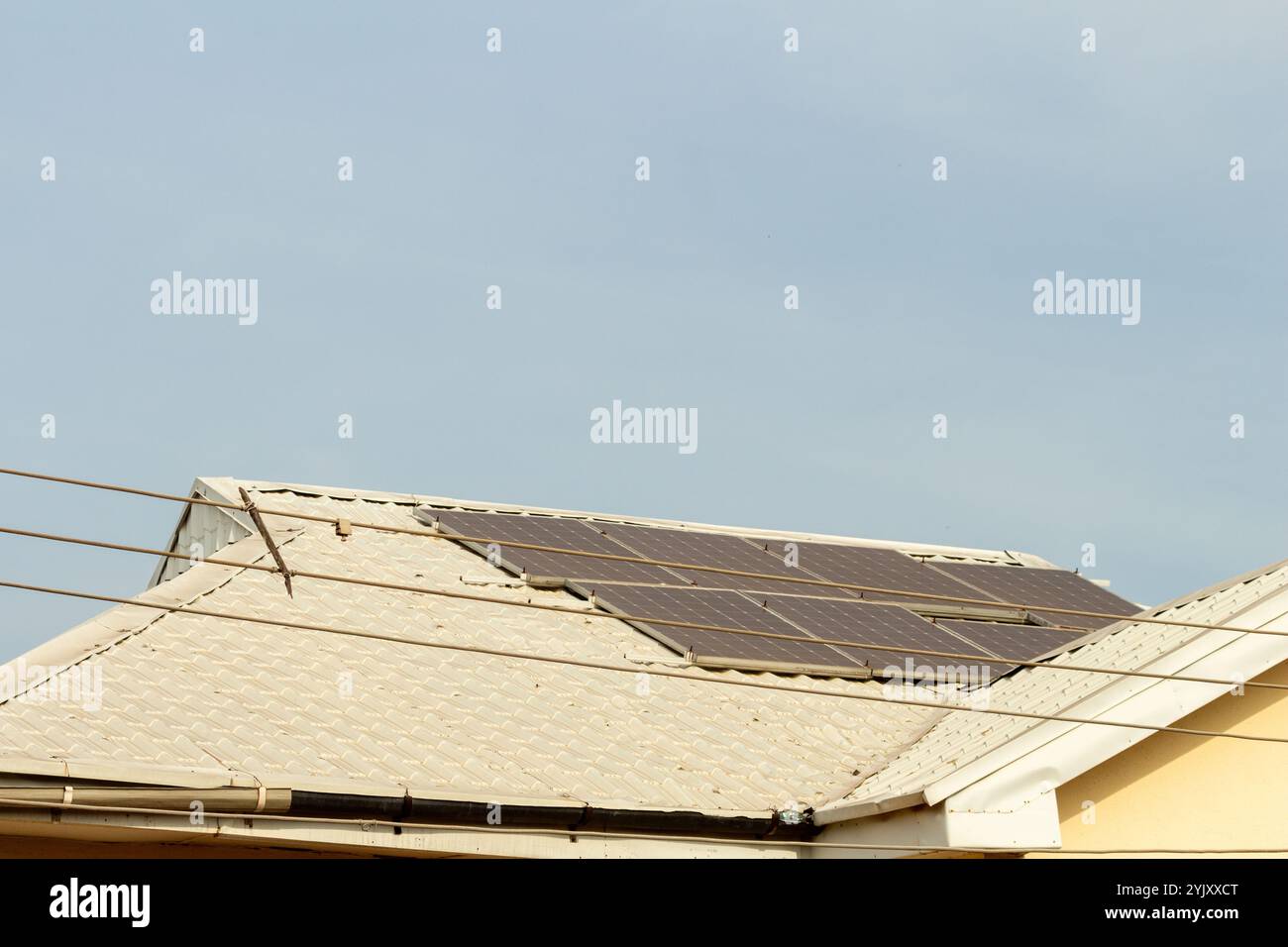 solar panel array on metal roof tops of residential buildings ...