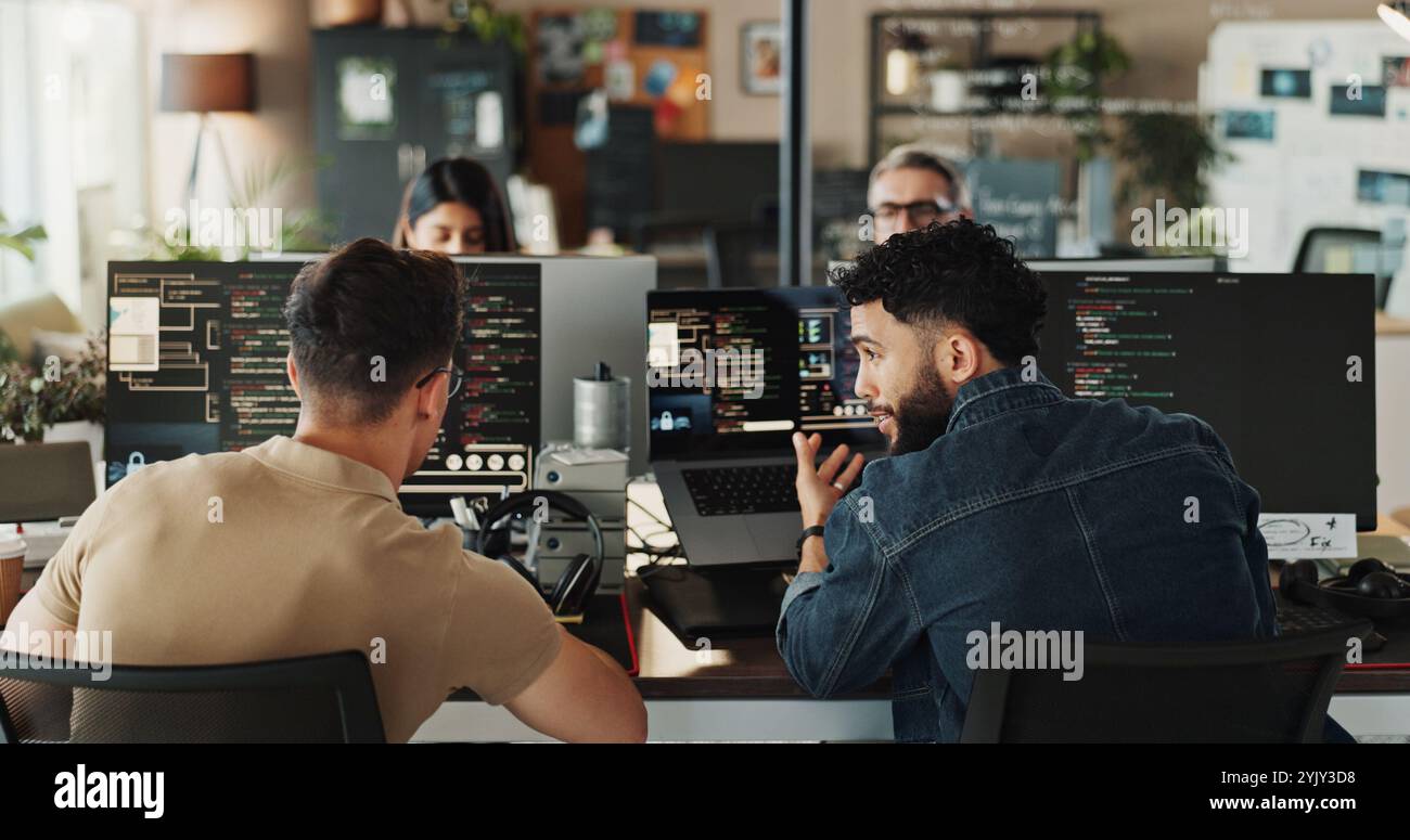 Man, developer and help with coding on computer screen in office for testing web application or troubleshooting. Programming, staff and employee with Stock Photo
