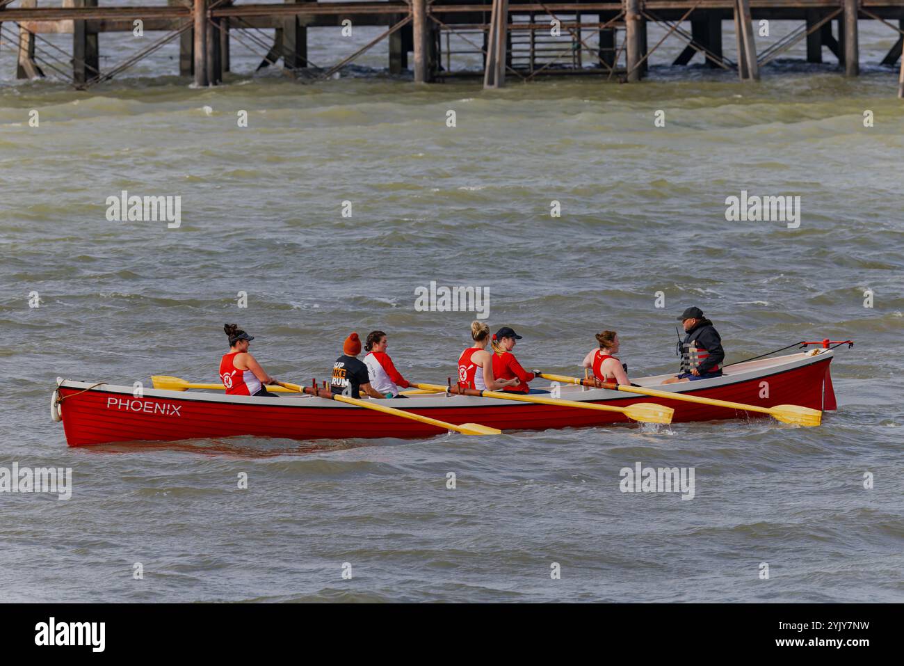 Pilot gig racing off Clevedon beach Stock Photo - Alamy