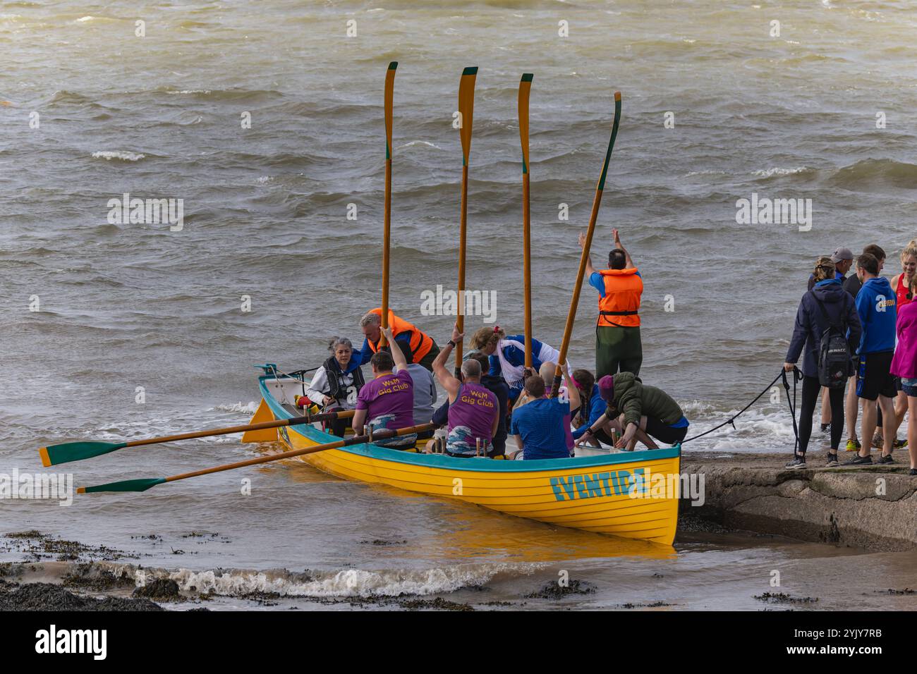 Pilot gig racing off Clevedon beach Stock Photo - Alamy