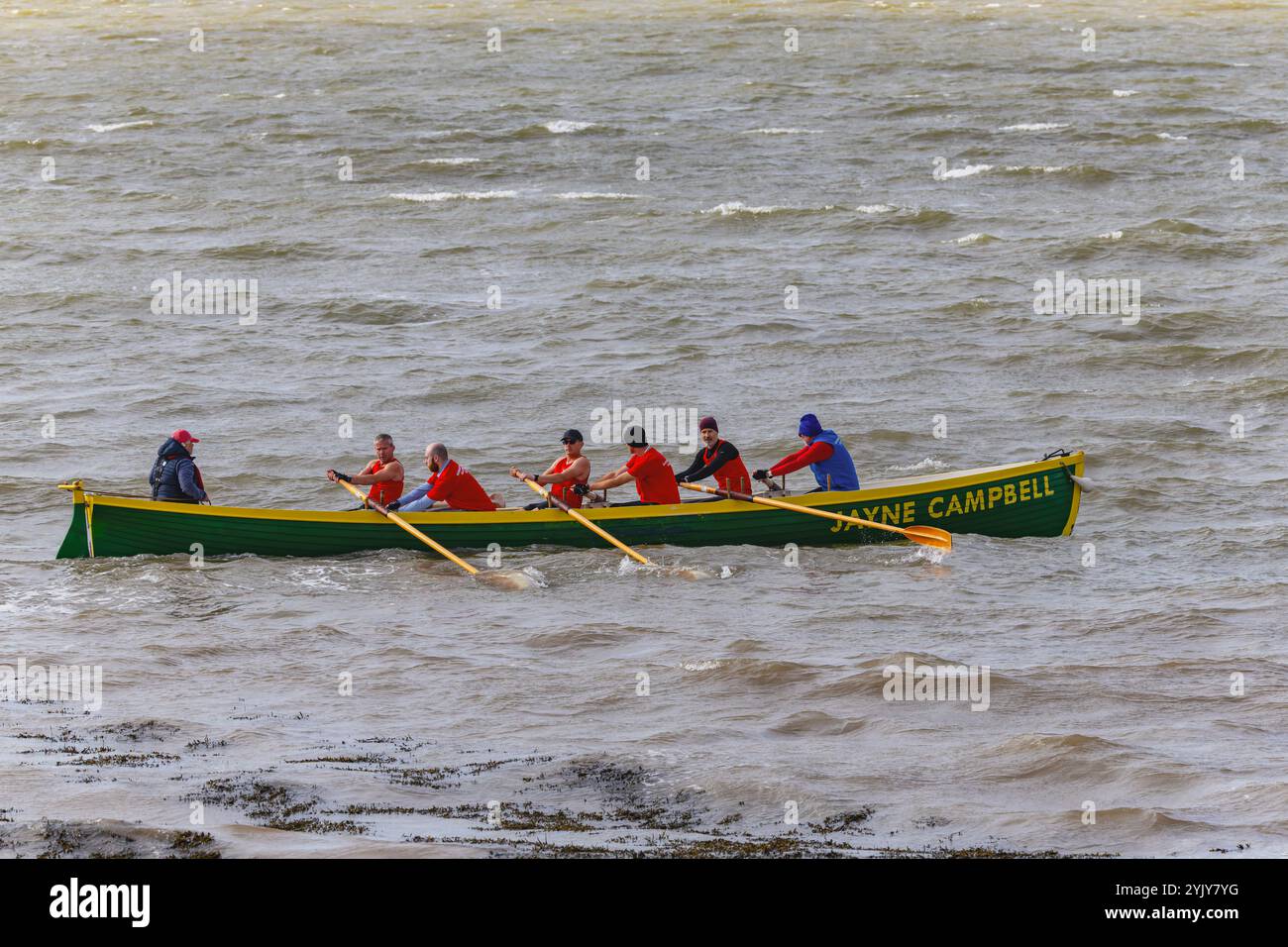 Pilot gig racing off Clevedon beach Stock Photo - Alamy