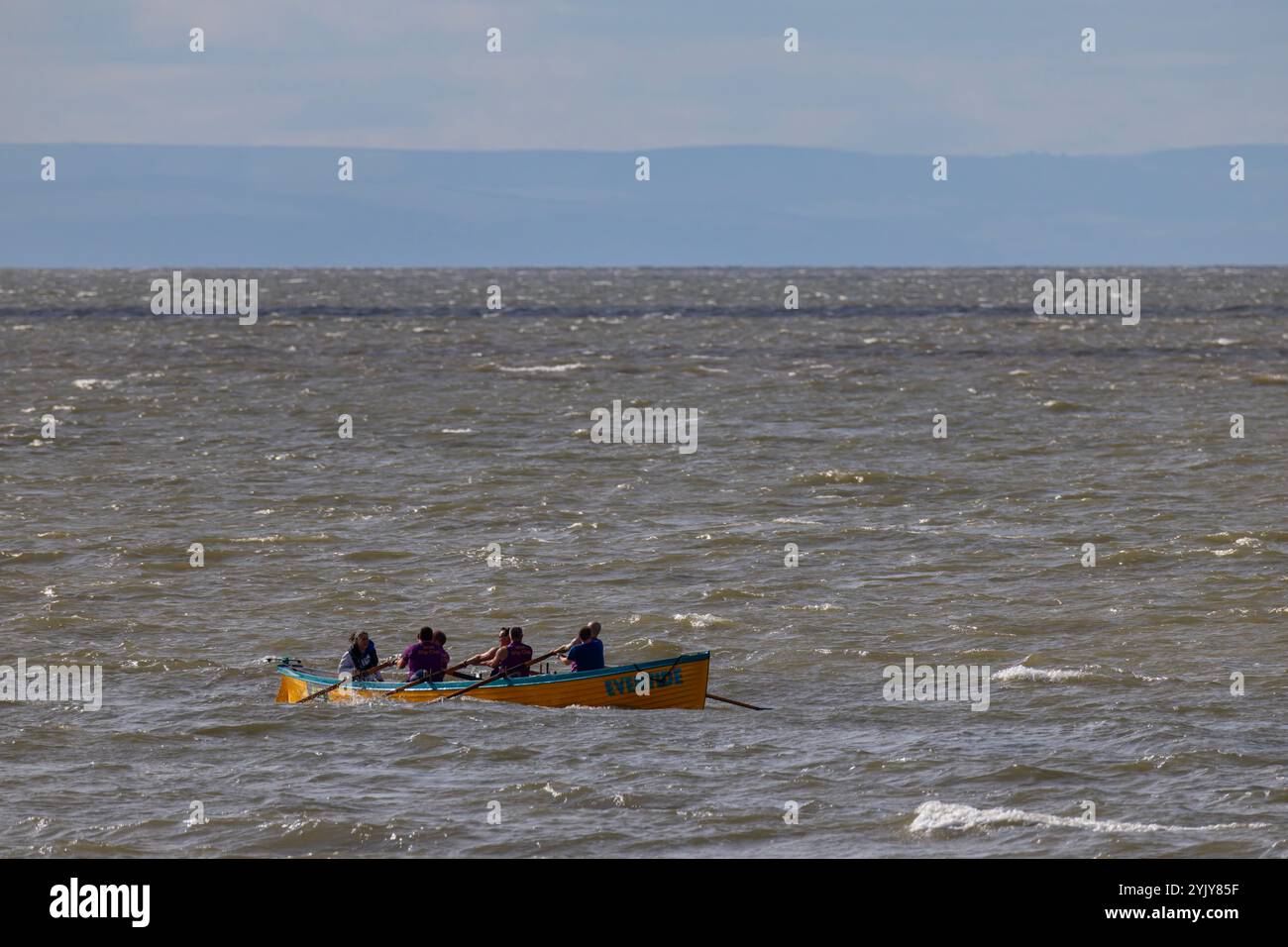 Pilot gig racing off Clevedon beach Stock Photo - Alamy